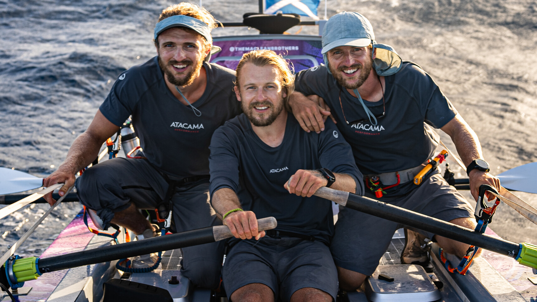 The Maclean brothers (Lachlan, Jamie, Ewan) are sitting in their rowboat on the open ocean